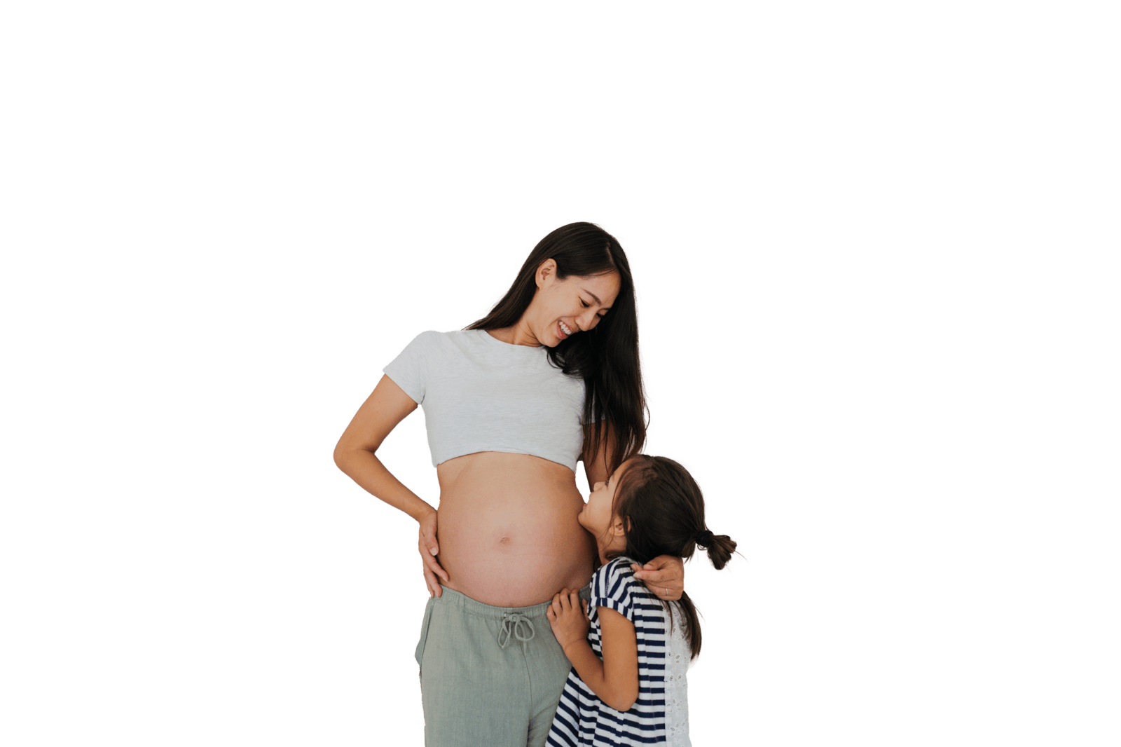 pregnant woman looking down at older daughter