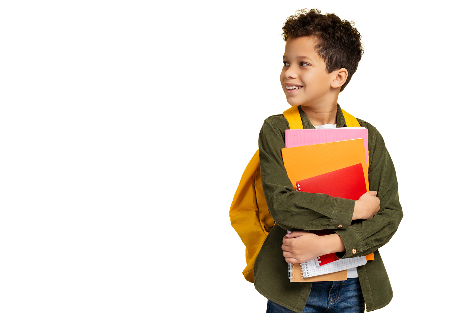 young boy holding books in hands with backpack on looking to the left